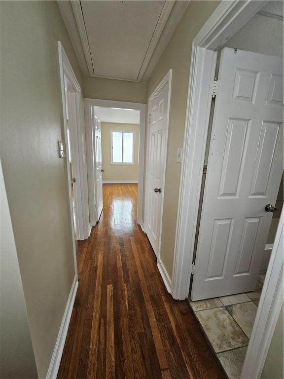 1732 Pennsylvania Ave, West Mifflin, PA 15122 - corridor with baseboards, wood finished floors, and attic access
