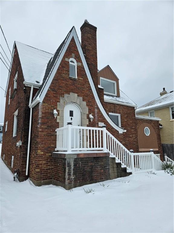 view of snow covered property