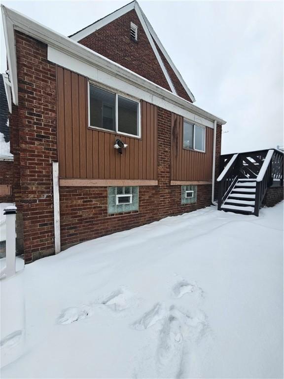 view of snow covered property