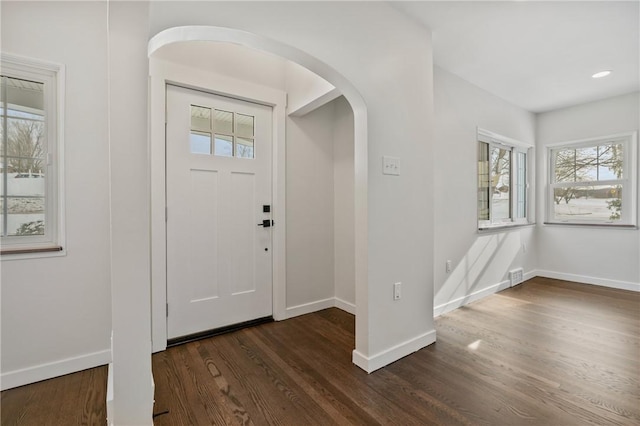 entrance foyer with dark hardwood / wood-style flooring