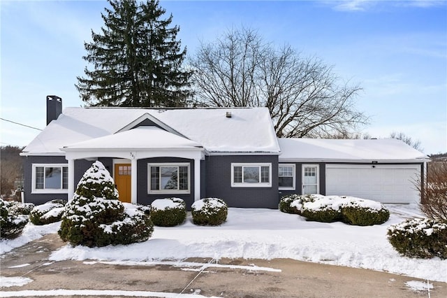 view of front of property featuring a garage