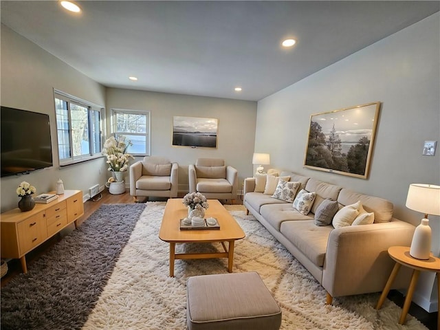 living room with light hardwood / wood-style flooring