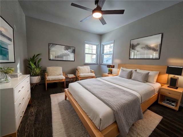 bedroom featuring dark hardwood / wood-style floors and ceiling fan