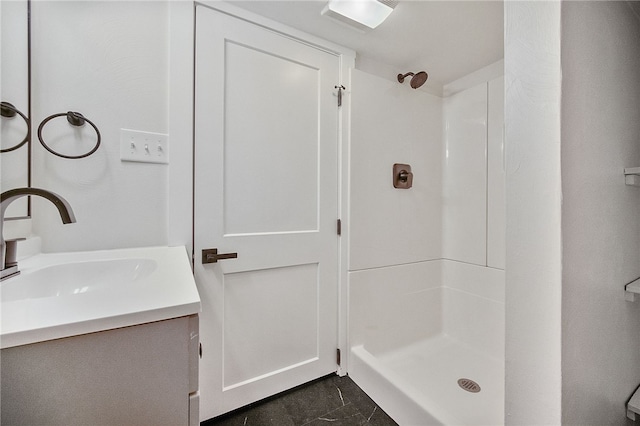 bathroom featuring vanity and walk in shower