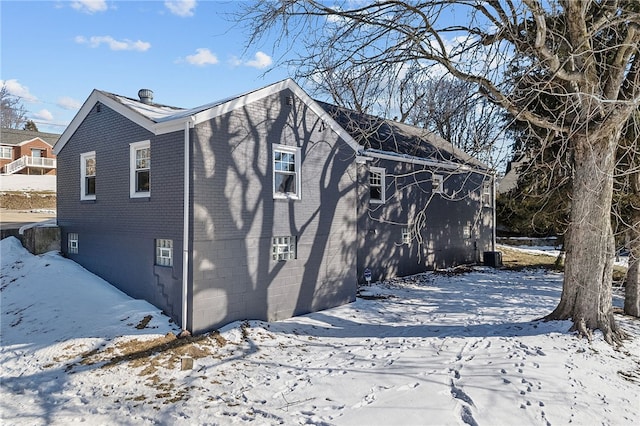 view of snow covered house