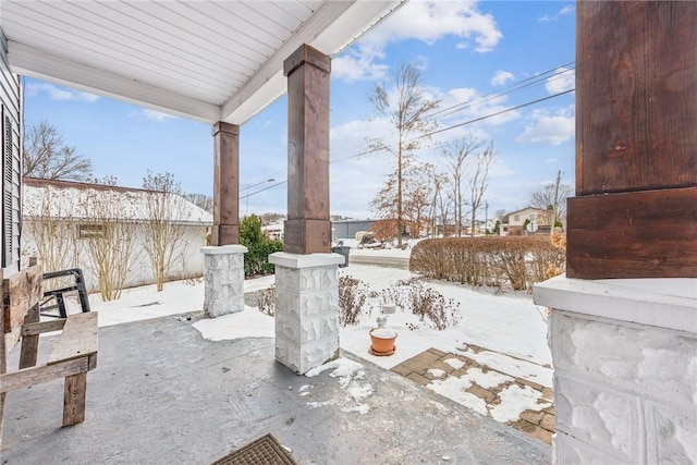 view of snow covered patio