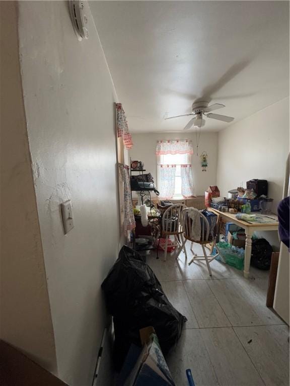 miscellaneous room featuring ceiling fan