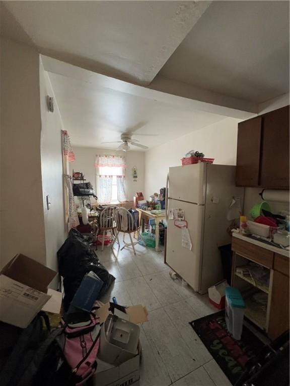 kitchen featuring white refrigerator and ceiling fan