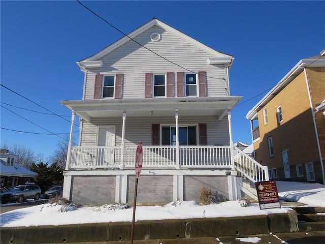 view of front property with covered porch