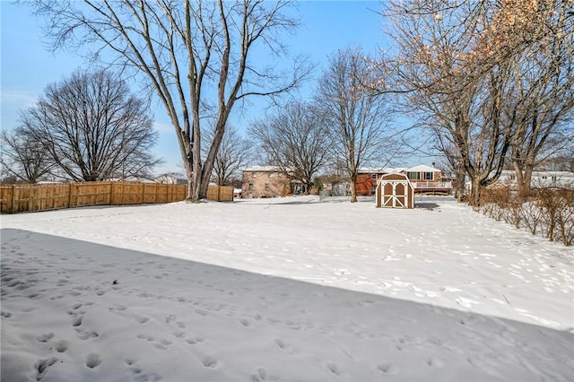 view of yard covered in snow