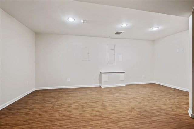 interior space featuring hardwood / wood-style floors and electric panel