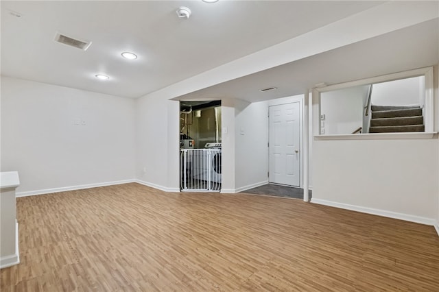 interior space with hardwood / wood-style floors