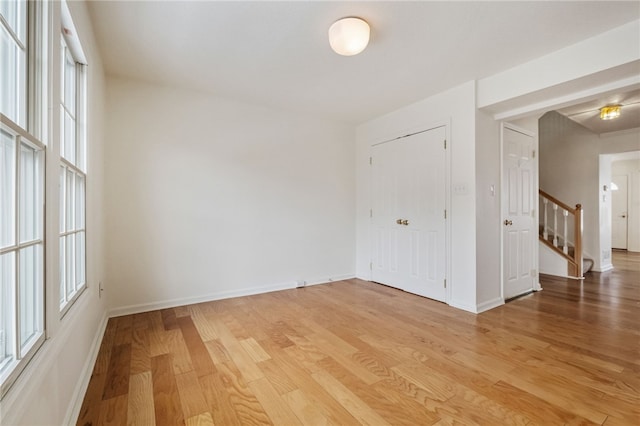 spare room with hardwood / wood-style flooring