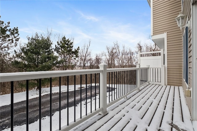 view of snow covered deck