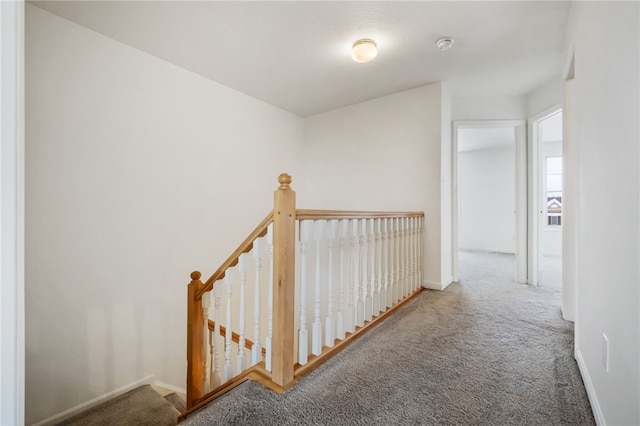 corridor featuring carpet flooring