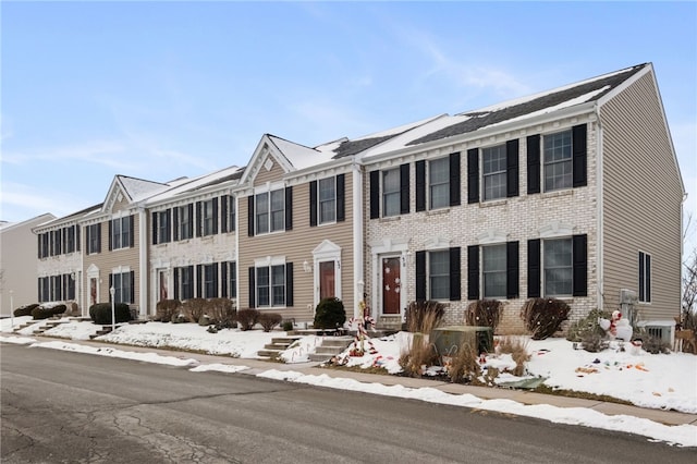 view of front of property featuring cooling unit