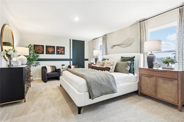 bedroom featuring light colored carpet