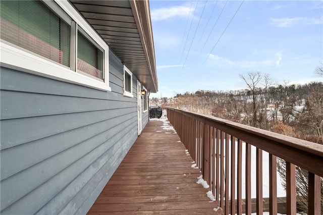 view of snow covered deck