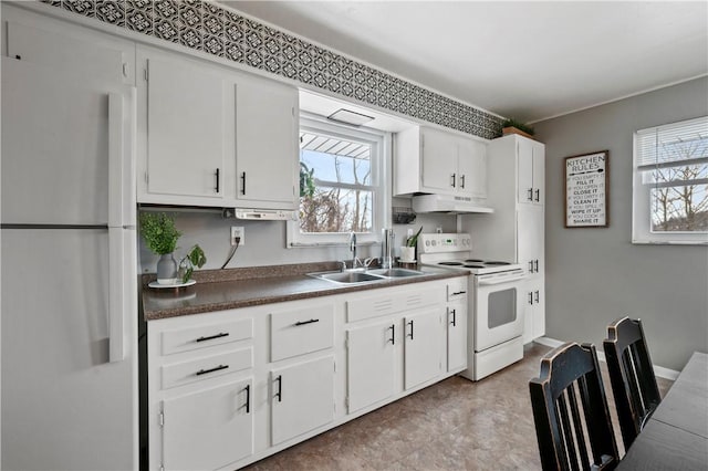 kitchen with white cabinetry, sink, and white appliances