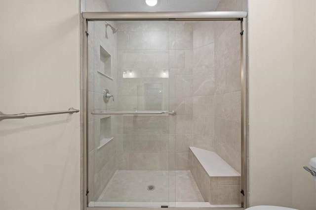 bathroom with an enclosed shower