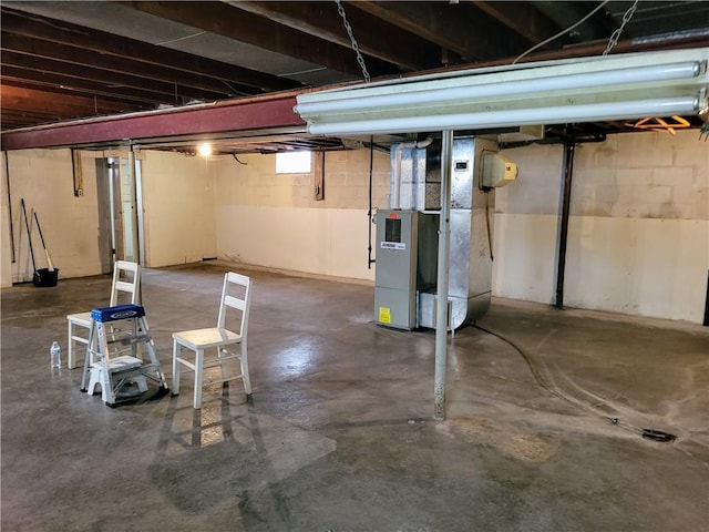 basement featuring heating unit