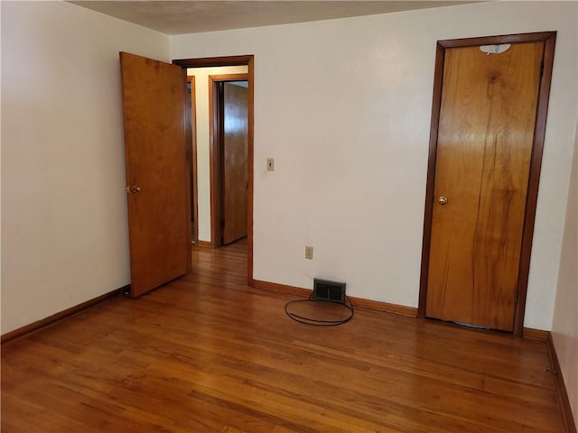 unfurnished bedroom featuring light hardwood / wood-style floors