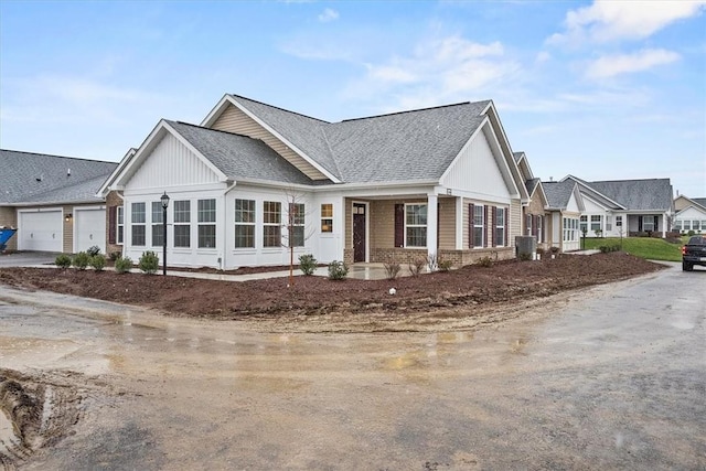 1261 Sandy Ridge Dr, Buffalo Twp, PA 16055 - view of front of home with cooling unit and a garage