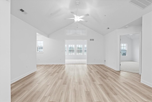 1261 Sandy Ridge Dr, Buffalo Twp, PA 16055 - unfurnished living room with ceiling fan, plenty of natural light, vaulted ceiling, and light wood-type flooring
