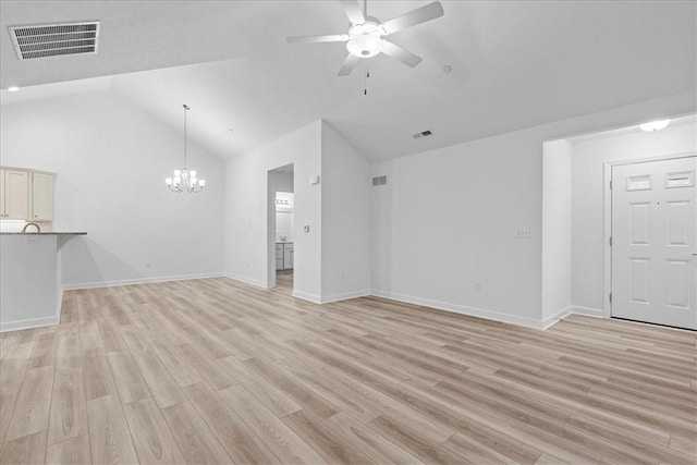1261 Sandy Ridge Dr, Buffalo Twp, PA 16055 - unfurnished living room with lofted ceiling, ceiling fan with notable chandelier, and light wood-type flooring