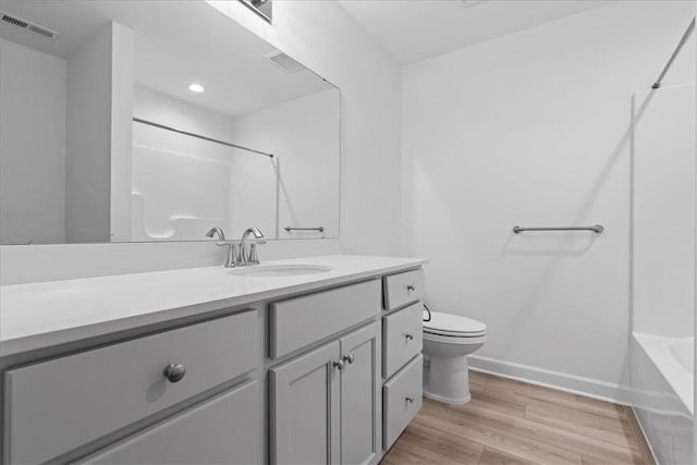 1261 Sandy Ridge Dr, Buffalo Twp, PA 16055 - bathroom featuring hardwood / wood-style flooring, vanity, and toilet