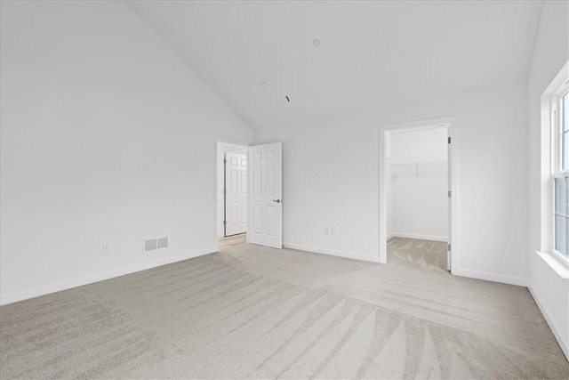 1261 Sandy Ridge Dr, Buffalo Twp, PA 16055 - empty room with light carpet, a wealth of natural light, and high vaulted ceiling