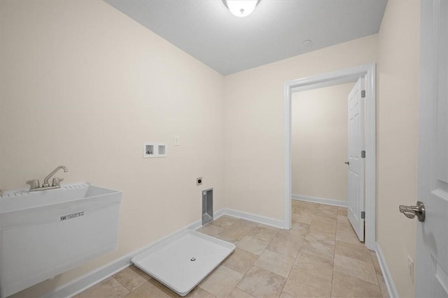 laundry area featuring sink, hookup for a washing machine, hookup for an electric dryer, and light tile patterned flooring