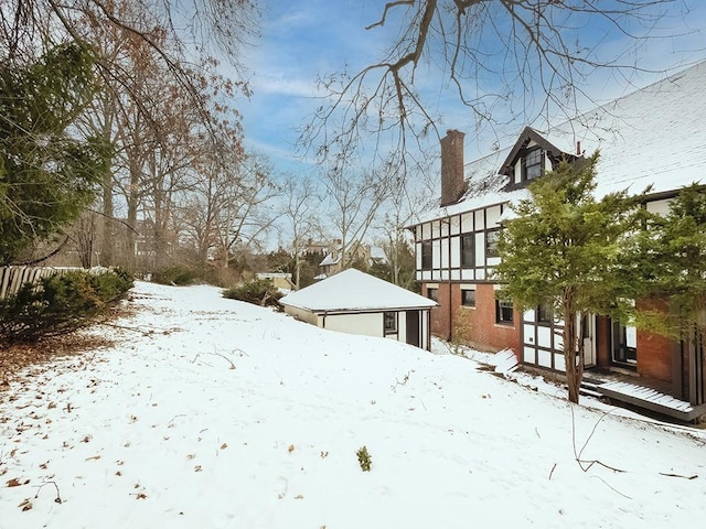 view of yard covered in snow