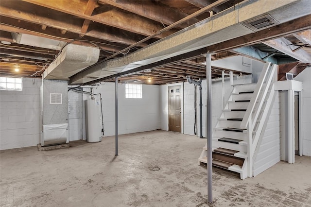 basement featuring gas water heater