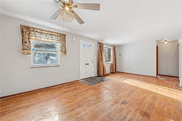 entryway featuring ceiling fan and wood-type flooring