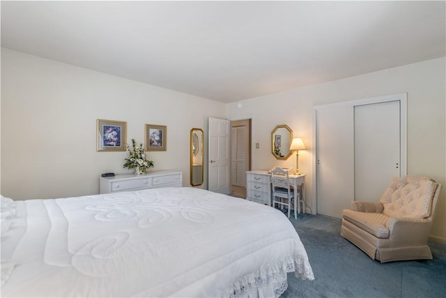 carpeted bedroom featuring a closet