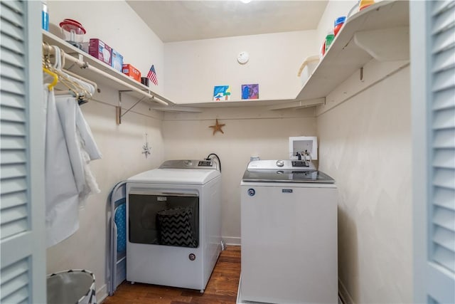 washroom with washer and dryer and dark hardwood / wood-style flooring