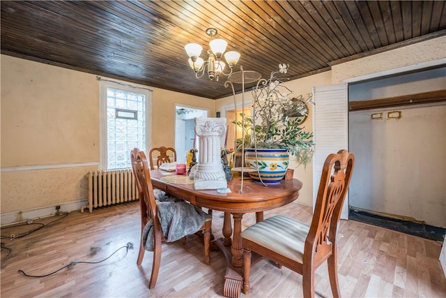 dining area with hardwood / wood-style flooring, wooden ceiling, radiator, and a notable chandelier