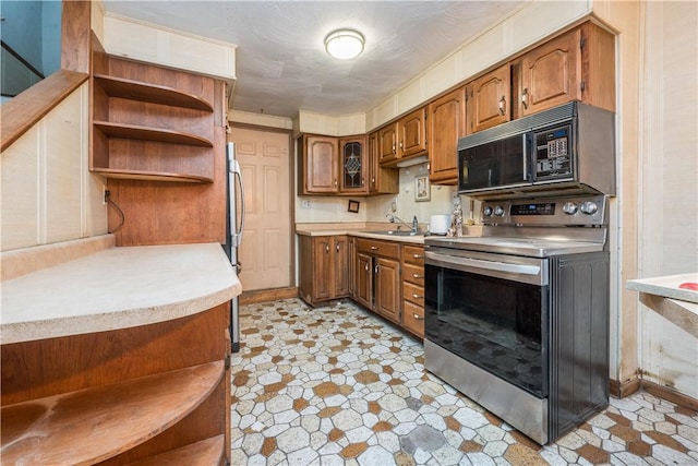 kitchen with appliances with stainless steel finishes and sink