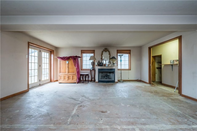 unfurnished living room with french doors