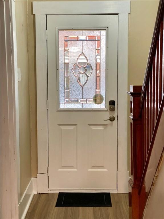 doorway to outside with hardwood / wood-style floors