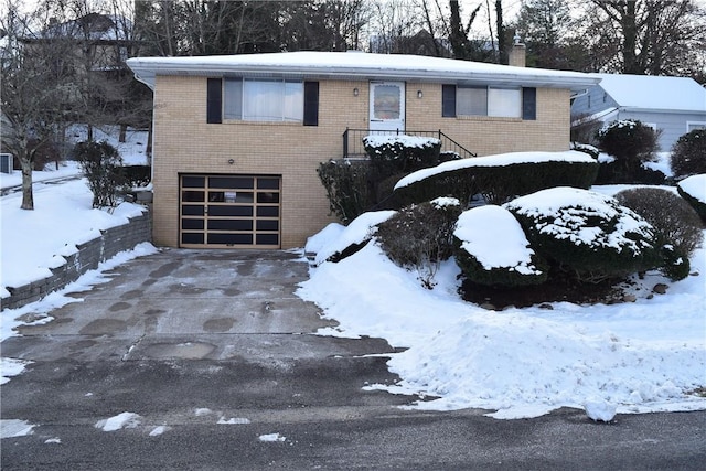 view of front of home with a garage