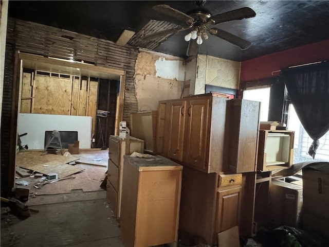 miscellaneous room featuring ceiling fan