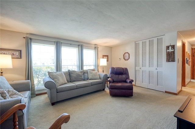 living room featuring light carpet