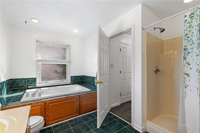 full bathroom featuring tile patterned floors, toilet, independent shower and bath, and vanity