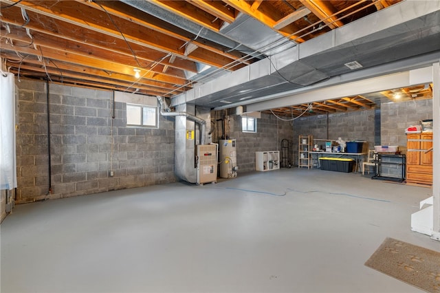 basement with heating unit and gas water heater