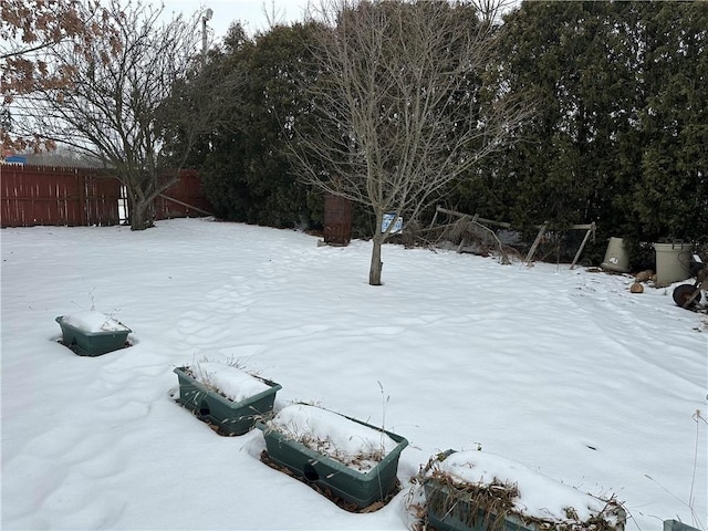 view of yard covered in snow