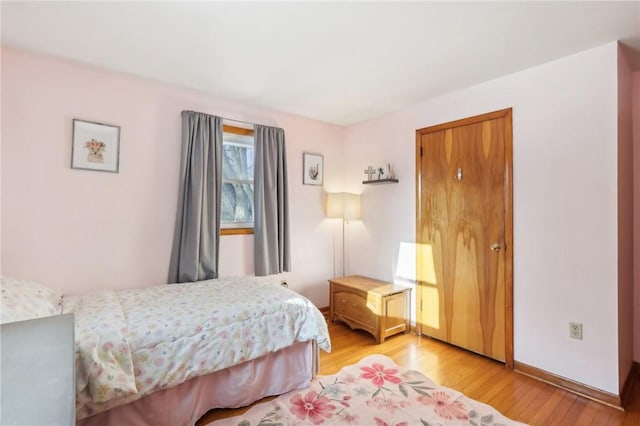 bedroom with light hardwood / wood-style floors