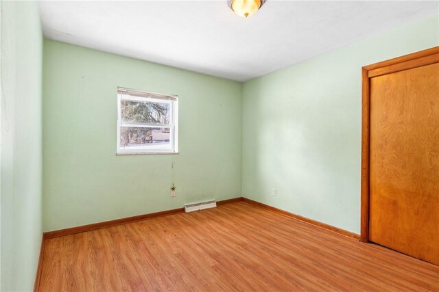 316 Noll Rd, Hanover Twp Bea, PA 15043 - unfurnished bedroom featuring light wood-style floors, baseboards, and visible vents