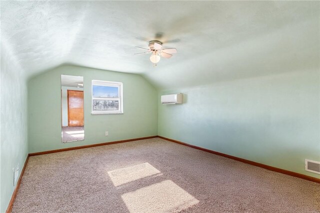 316 Noll Rd, Hanover Twp Bea, PA 15043 - bonus room featuring a ceiling fan, visible vents, vaulted ceiling, carpet flooring, and an AC wall unit